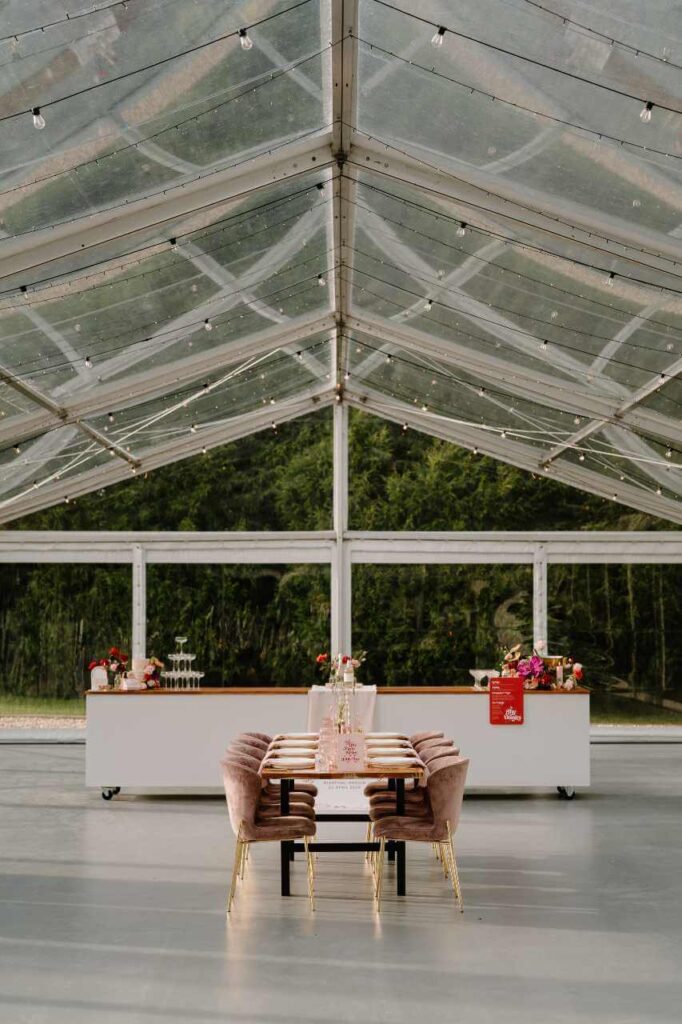 clear roof marquee with bar and table setting