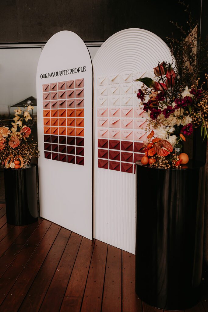 A board of table setting letters in autumn hues.